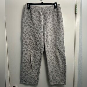 Grey pajama pants with cheetah pattern.